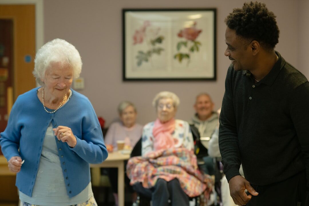 Seniors doing a gentle group exercise class