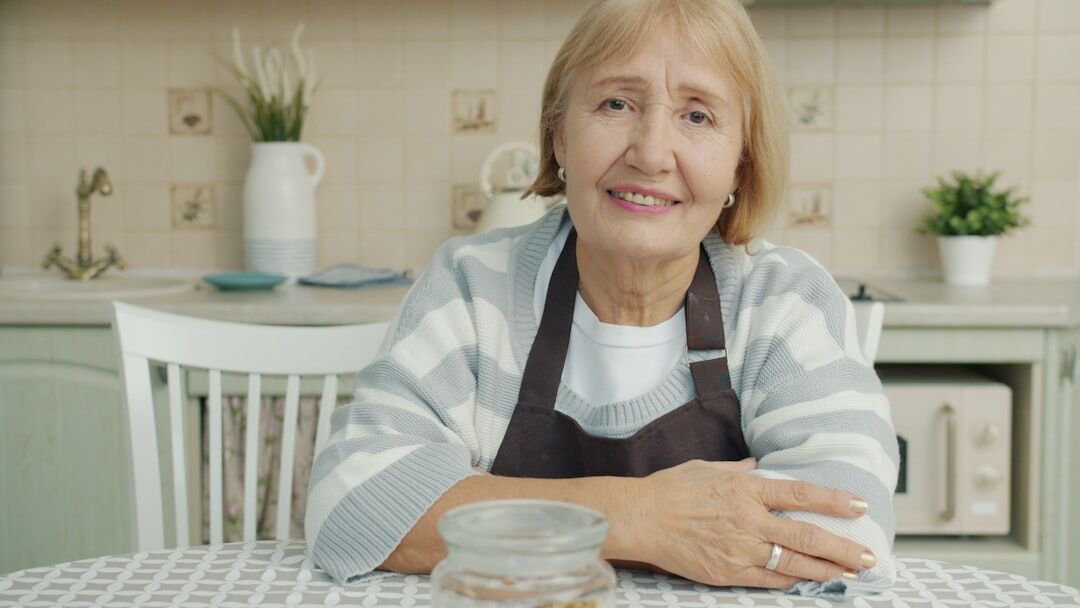 senior woman cooking healthy meal